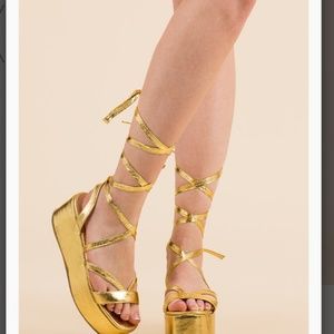 Gold platform shoe